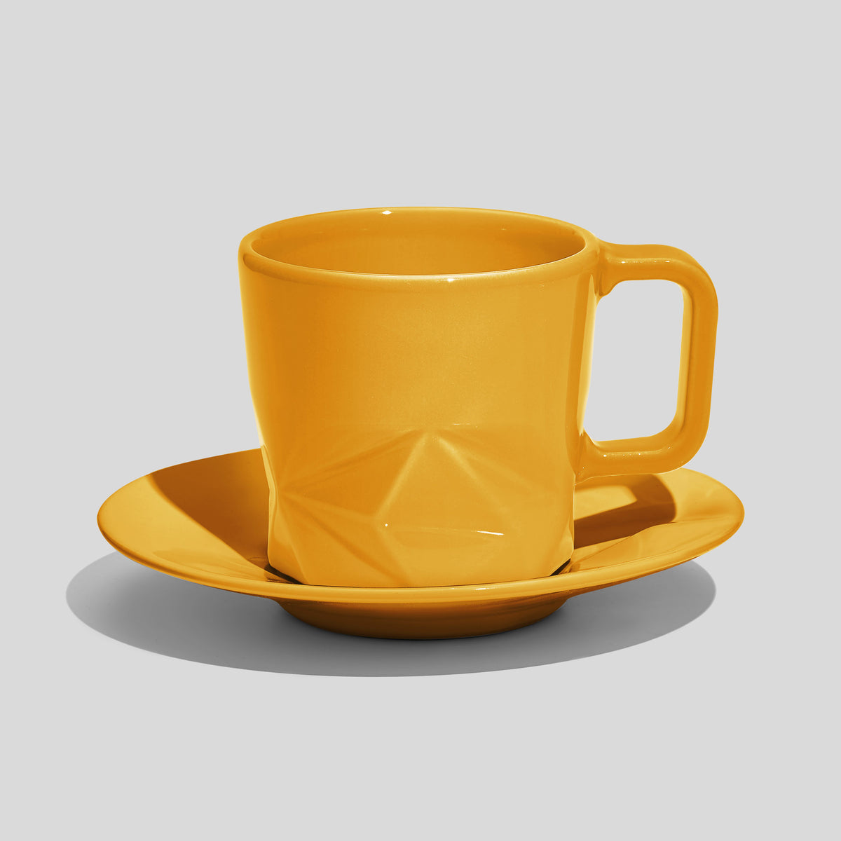 Facettierte Tasse mit Untertasse 200 ml – Gelb