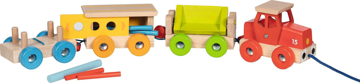 Güterzug aus Holz mit Lok und drei Wagen von goki – Seitenansicht