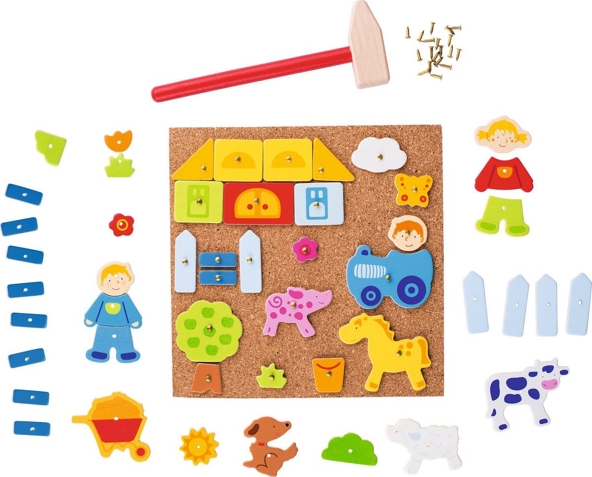 Hammerspiel Farm mit Tieren, Traktor und Korkplatte – Detail