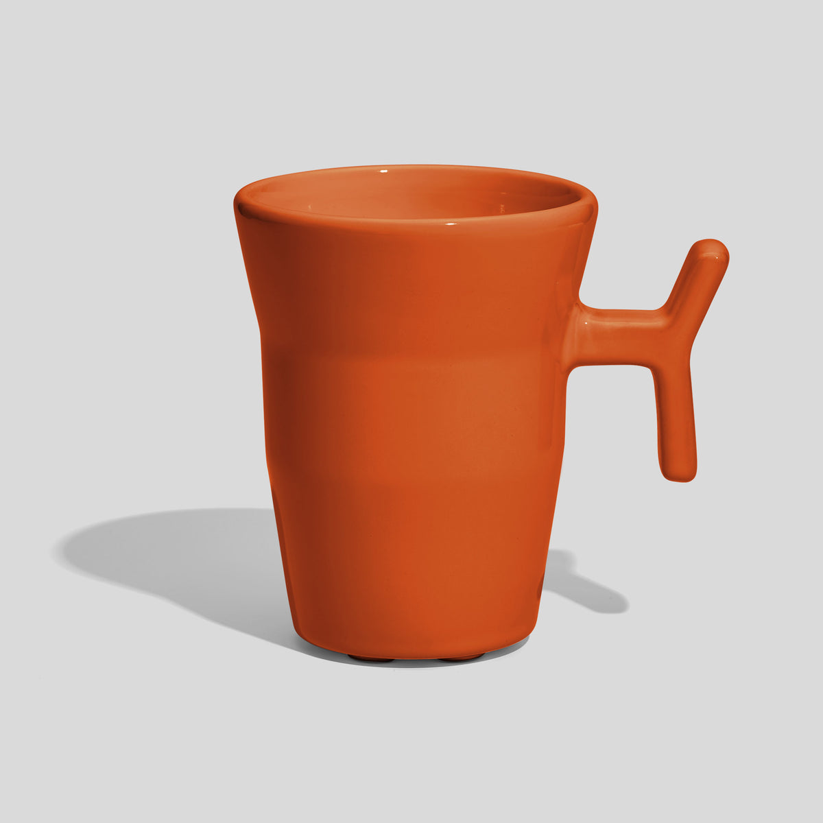 Keramiktasse 330 ml mit Stabhenkel und Formdelle – Orange