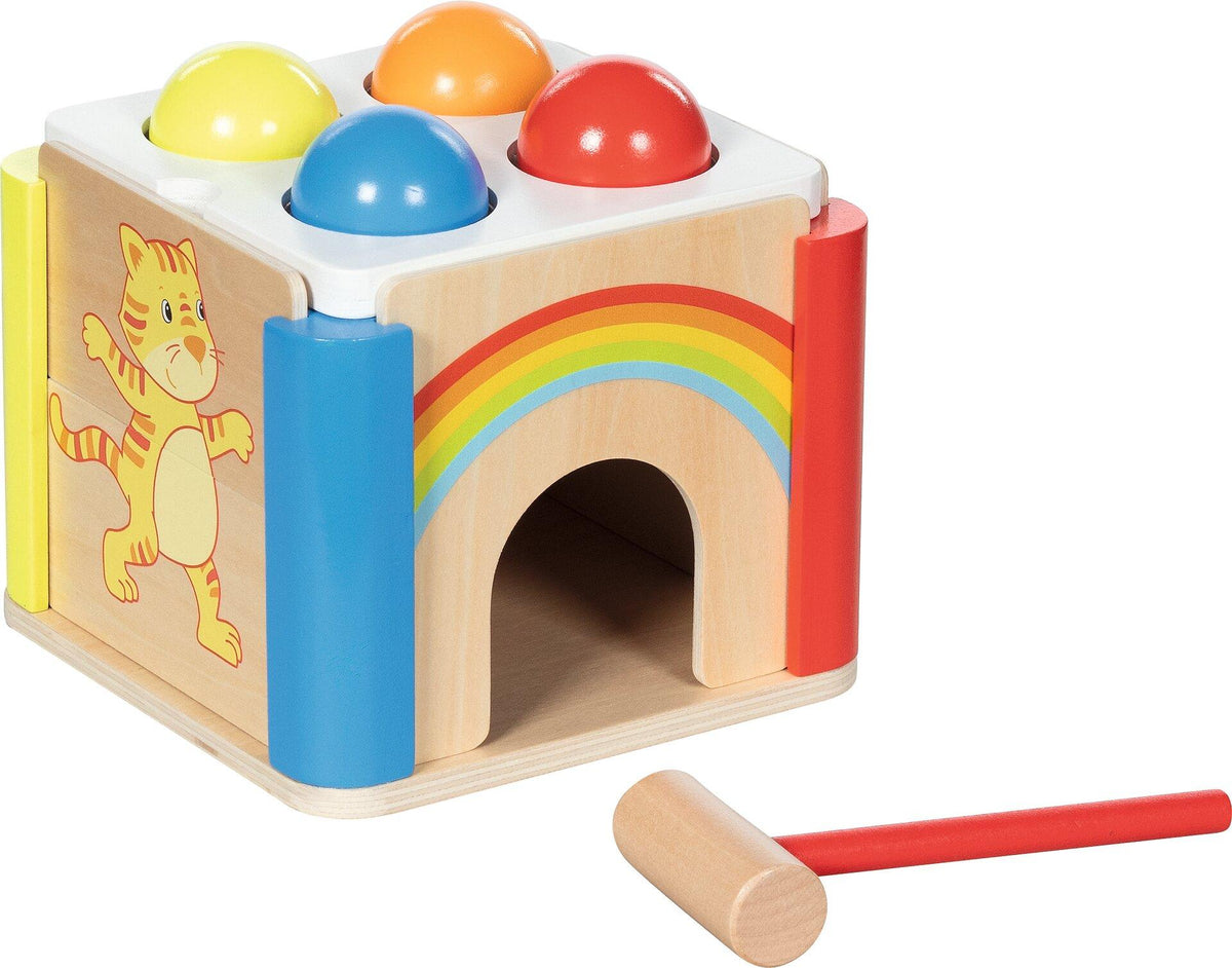 Klopfkiste Regenbogen mit Hammer und vier Kugeln