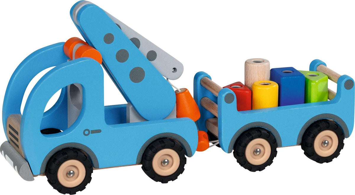 Kranwagen mit Anhänger und fünf Magnetbausteinen