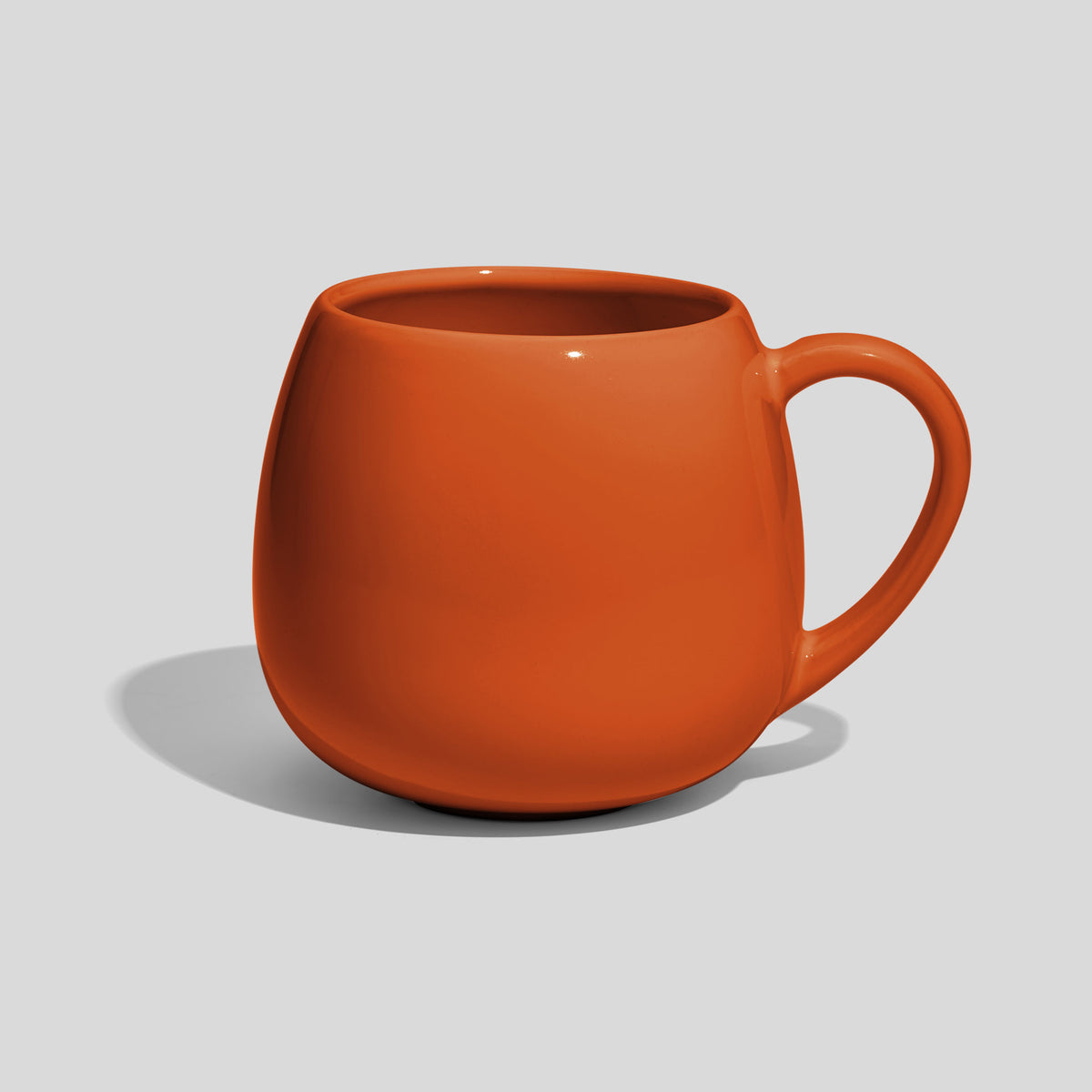 Rundbauchige Keramiktasse 420 ml mit schlankem Henkel – Orange
