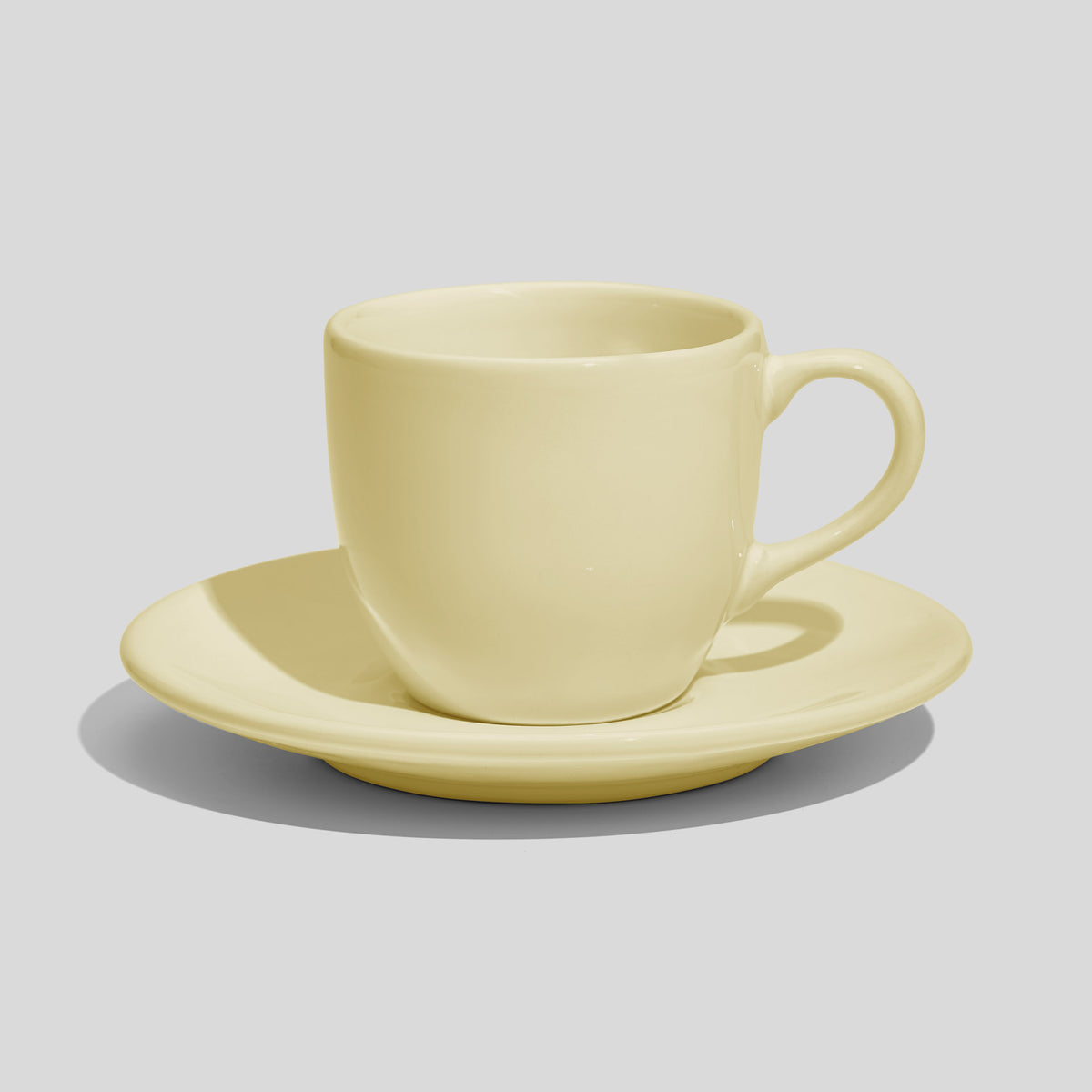 Rundliche Tasse mit Untertasse 180 ml und Bogenhenkel – Ecru