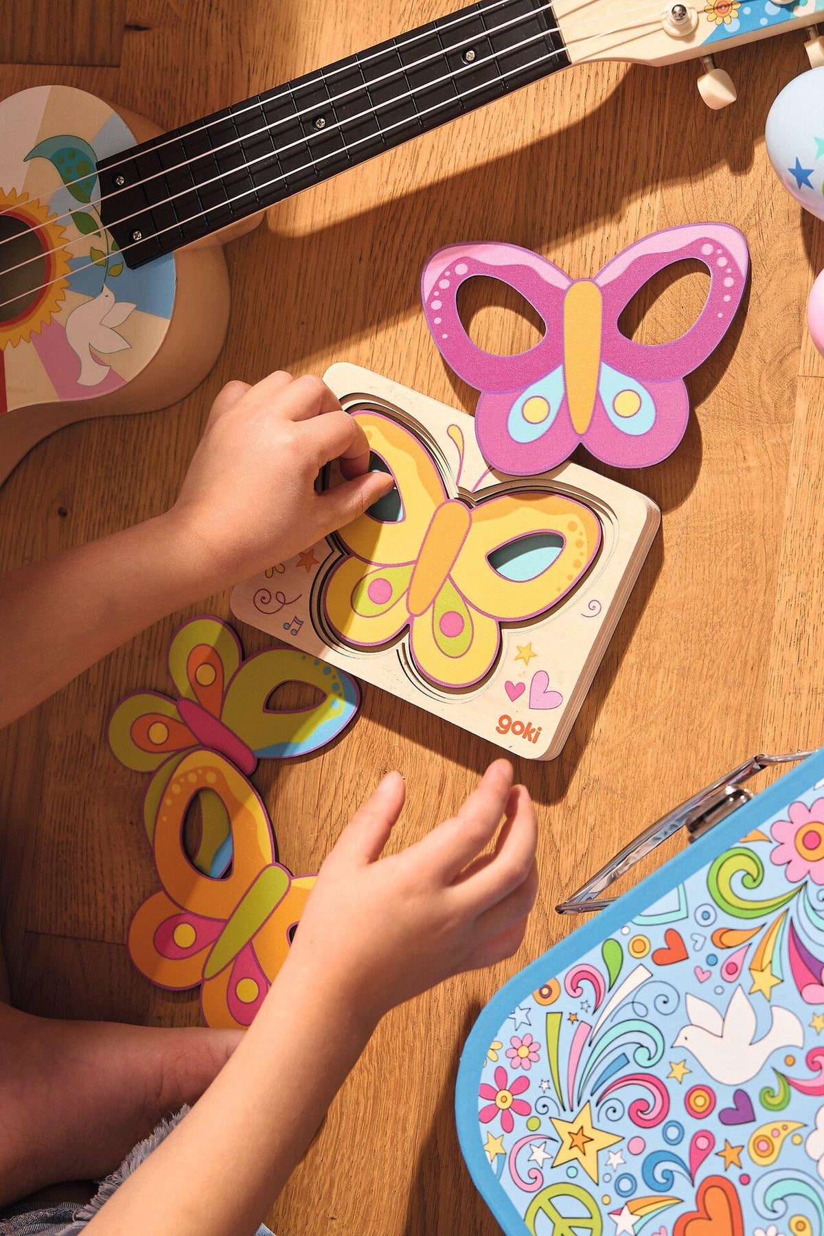 Schichtenpuzzle Schmetterling mit rosa Flügeln aus Holz – vierte Ansicht