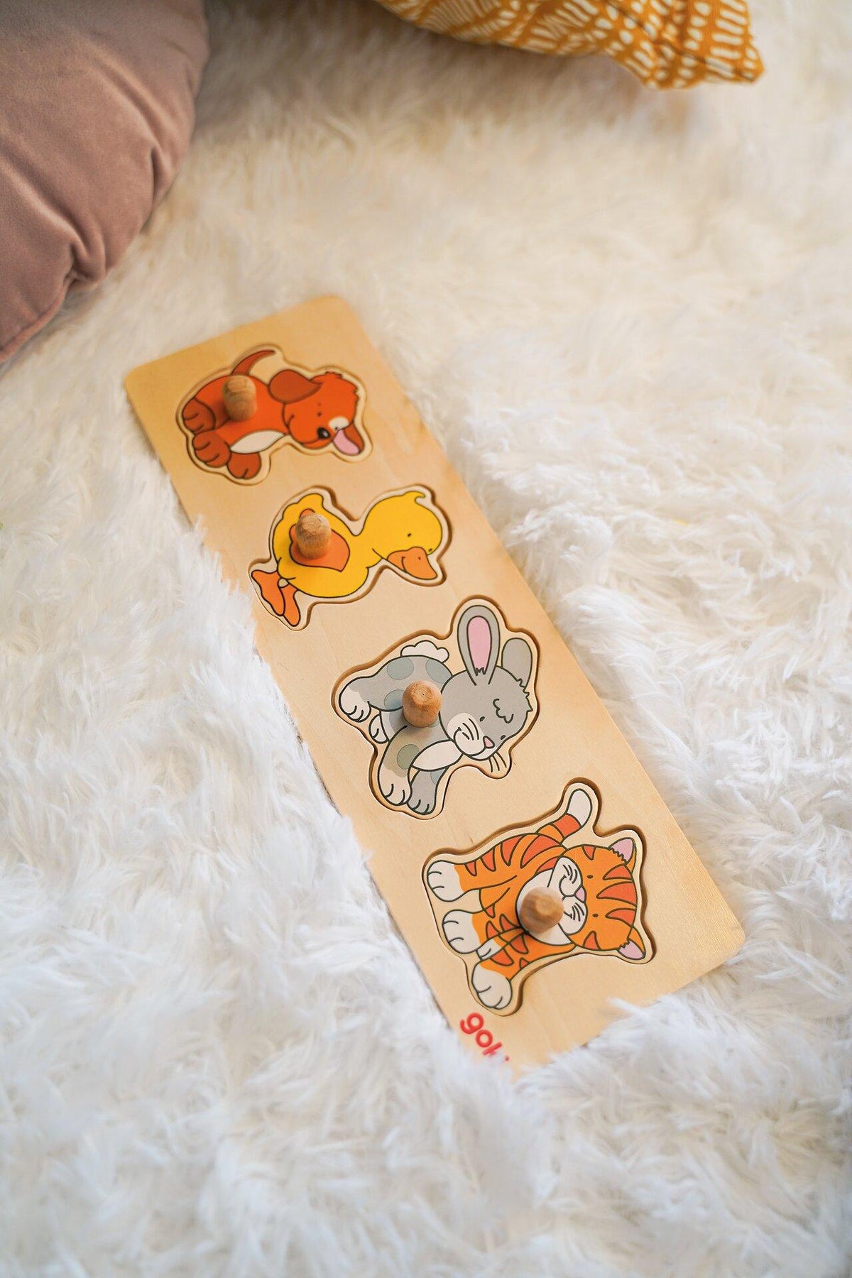 Schmales Steckpuzzle mit Hund, Ente, Hase und Katze