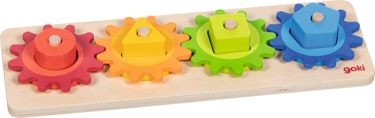 Sortierspiel mit vier bunten Zahnrädern aus Holz