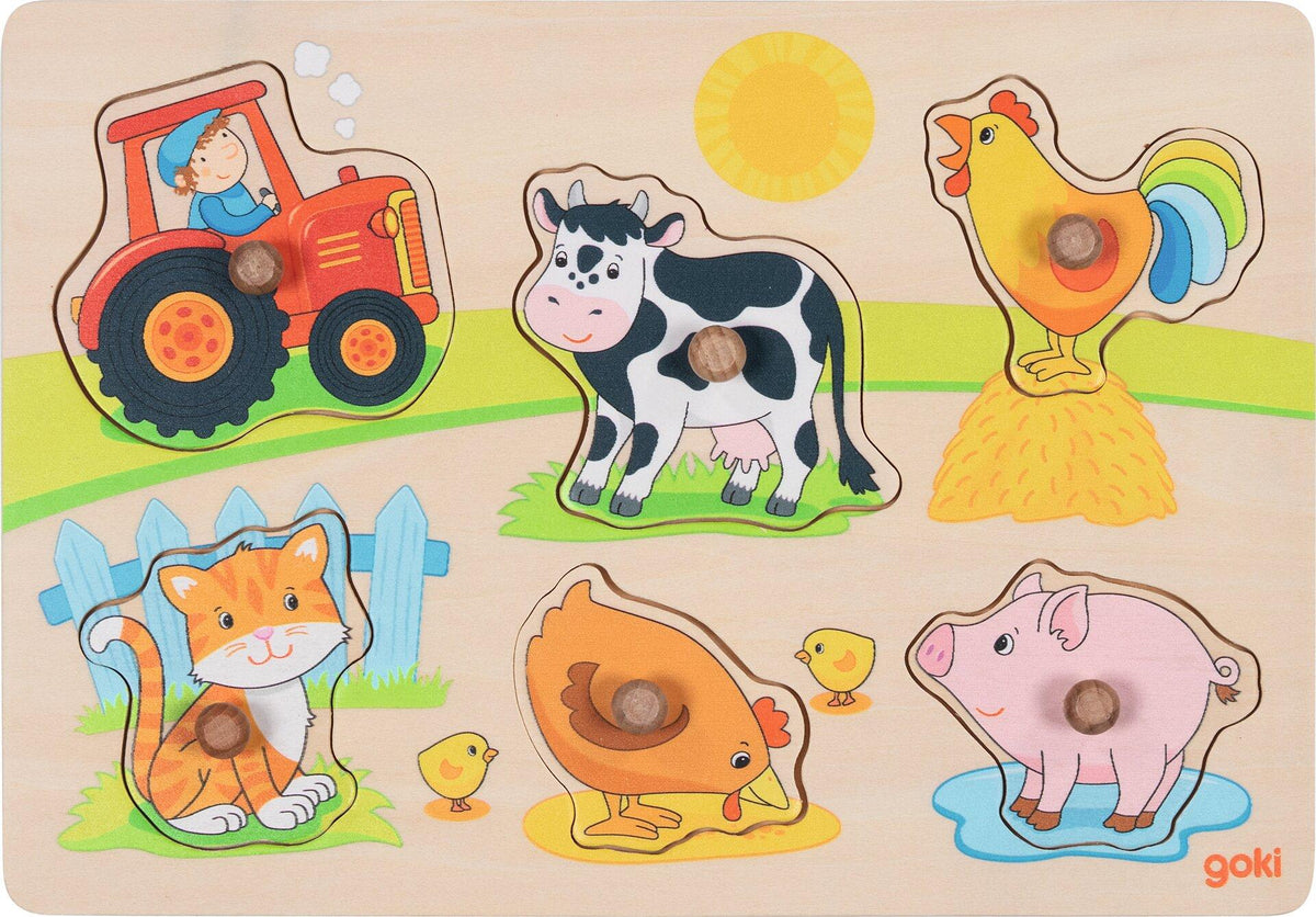 Steckpuzzle Auf dem Bauernhof mit Kuh und Traktor