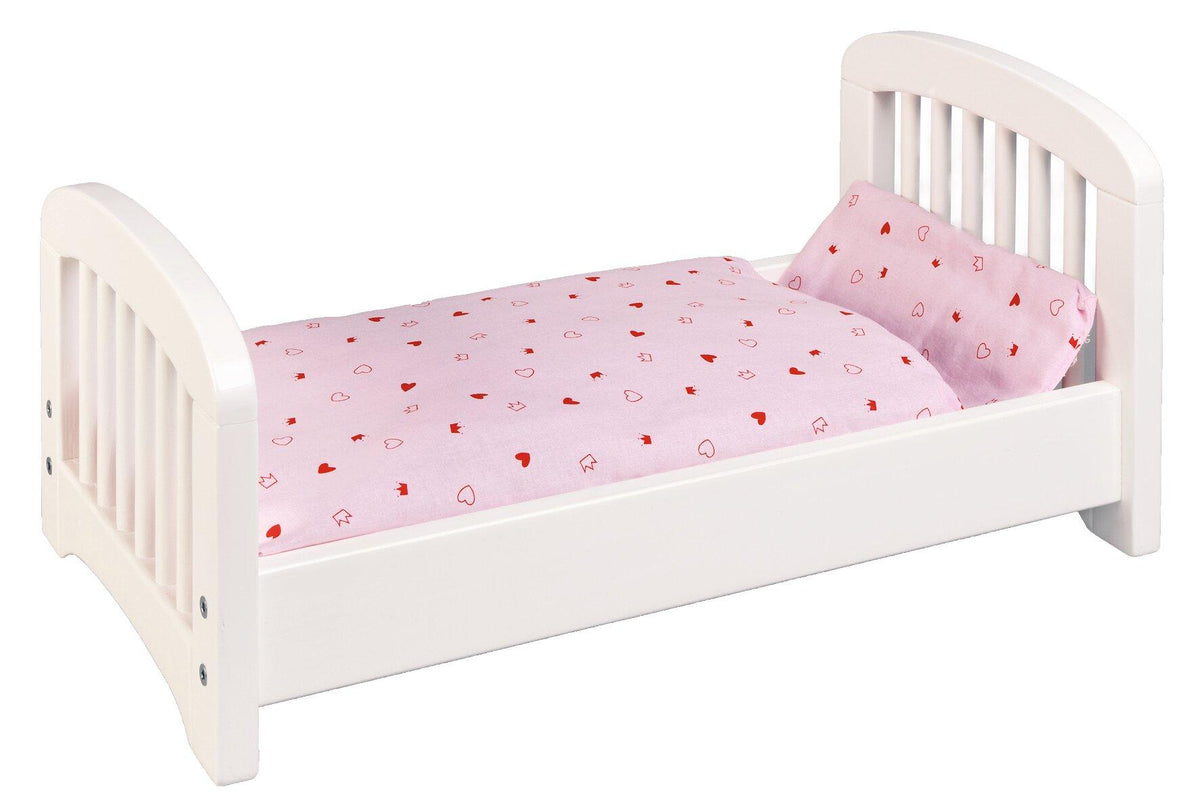 Weißes Puppenbett aus Holz mit gewölbtem Kopfteil