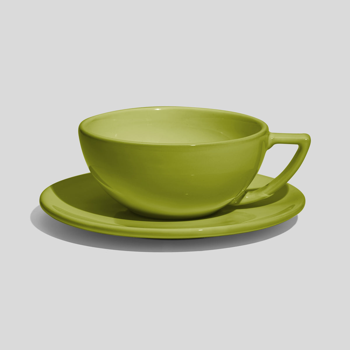 Weite Schalentasse mit Dreiecksgriff und Untertasse 280 ml – Limettengrün